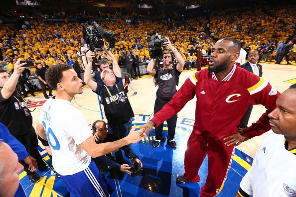 Stephen Curry #30 of the Golden State Warriors and LeBron James #23 of the Cleveland Cavaliers