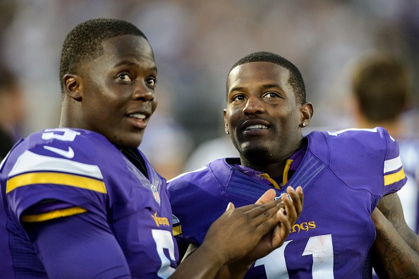 Teddy Bridgewater #5 and Mike Wallace #11 of the Minnesota Vikings