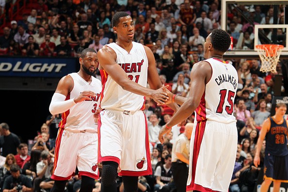 Hassan Whiteside #21 and Mario Chalmers #15 of the Miami Heat 