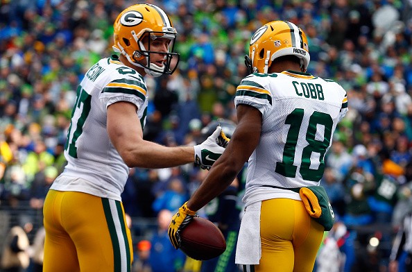 Jordy Nelson #87 celebrates with Randall Cobb #18 of the Green Bay Packers 