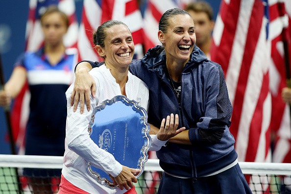 Flavia Pennetta (R) of Italy and Roberta Vinci