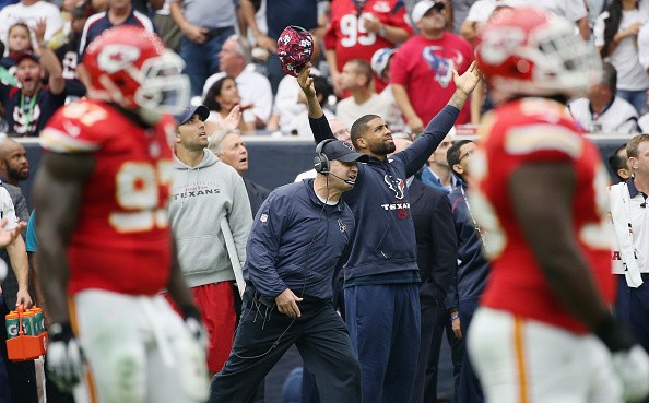 Head coach Bill O'Brien and Arian Foster #23 of the Houston Texans 
