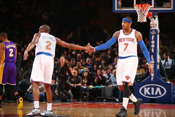 Carmelo Anthony #7 high fives teammate Langston Galloway #2 of the New York Knicks