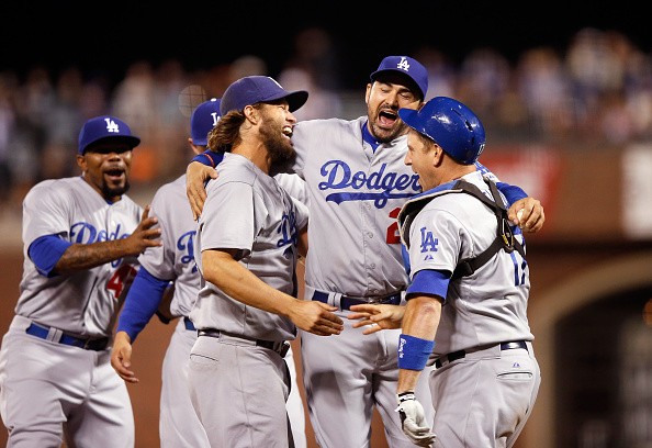 Clayton Kershaw #22, Adrian Gonzalez #23 and A.J. Ellis #17 of the Los Angeles Dodgers
