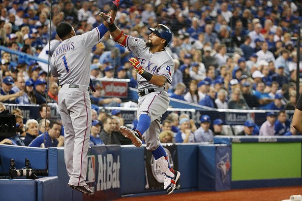 Rougned Odor celebrates a home run with Elvis Andrus
