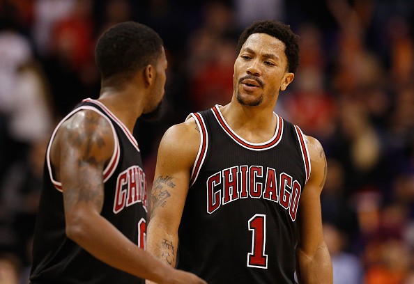 Derrick Rose #1 and Aaron Brooks #0 of the Chicago Bulls 