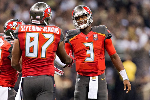 Jameis Winston #3 talks with Austin Seferian-Jenkins #87 of the Tampa Bay Buccaneers