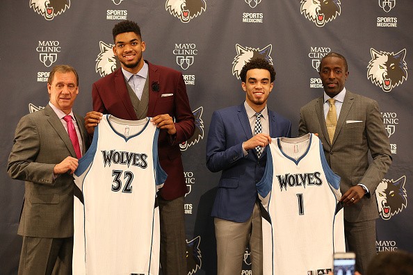 2015 NBA Overall #1 draft pick Karl-Anthony Towns and 22nd pick Tyus Jones of the Minnesota Timberwolves