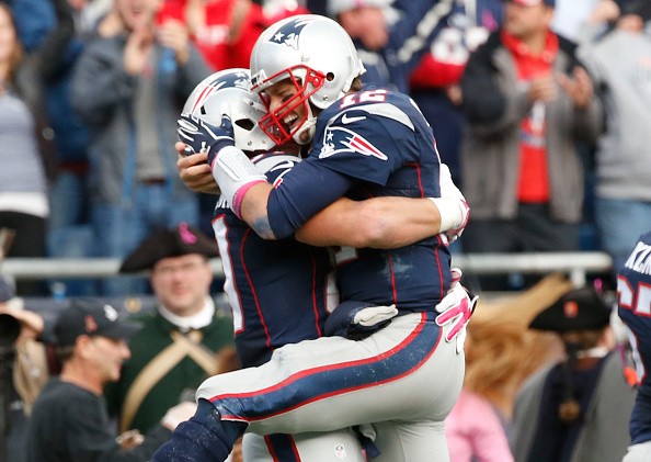 Patriots quarterback Tom Brady celebrates with Rob Gronkowski