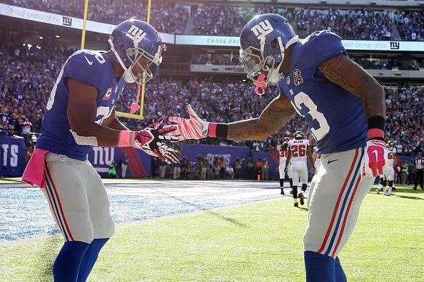 Wide receiver Odell Beckham #13 of the New York Giants, Victor Cruz #80