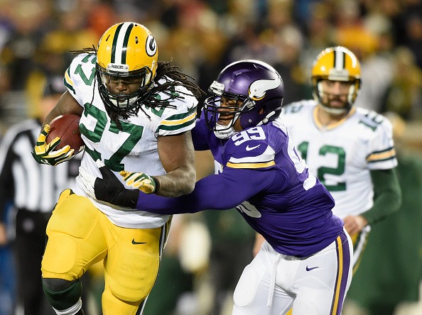 Aaron Rodgers #12 of the Green Bay Packers, Eddie Lacy #27 