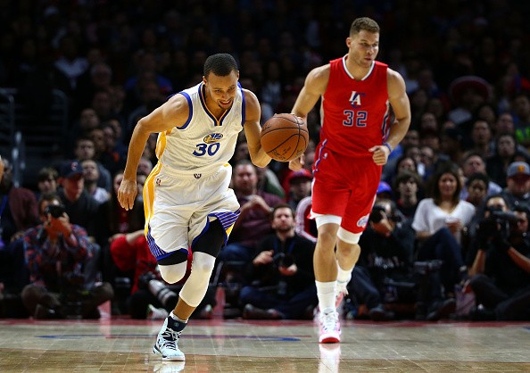 Stephen Curry #30 of the Golden State Warriors, Blake Griffin #32 of the Los Angeles Clippers 