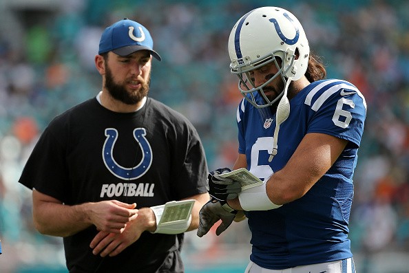 Charlie Whitehurst #6 of the Indianapolis Colts talks with Andrew Luck #12