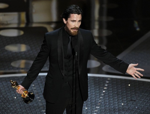 British actor Christian Bale accepts the Oscar for best supporting actor 