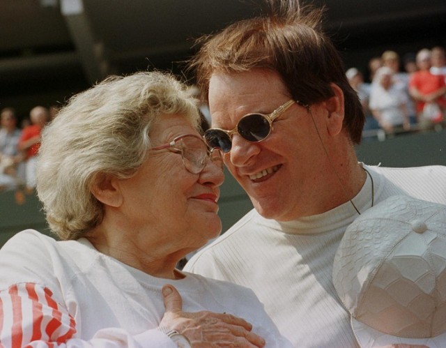 File photo of then Cincinnati Reds owner Marge Schott chatting with former Reds great Pete Rose