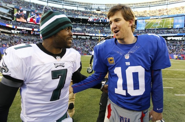 New York Giants quarterback Eli Manning talks with Philadelphia Eagles quarterback Michael Vick 