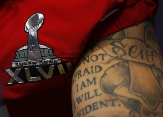 Colin Kaepernick Tattoos Super Bowl Emblem 