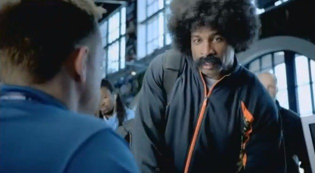 A screengrab from Deion Sanders in his commercial where he played a character named "Leon Sandcastle"