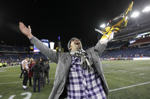 Michael Phelps celebrates the Ravens' Super Bowl win with Ray Lewis