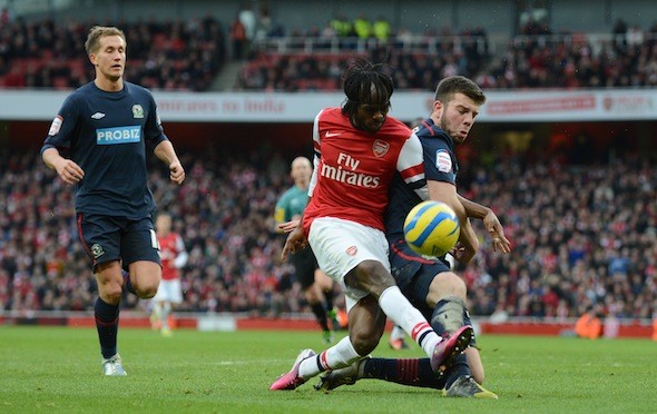 Arsenal's Gervinho is tackled by Blackburn Rovers' Grant Hanley (