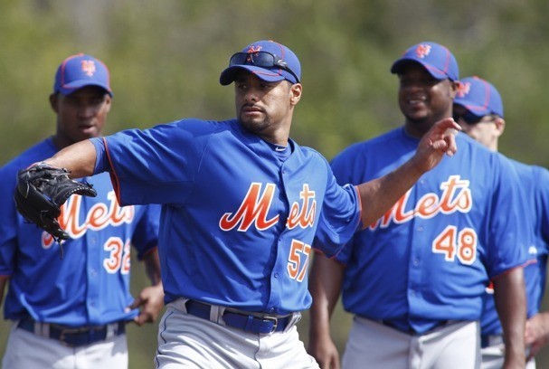 Mets opening day starter Johan Santana simulates a throw during a spring training workout